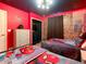 Spider-Personal themed bedroom with twin beds, a dresser, and a gaming nook at 1471 Rolling Fairway Dr, Davenport, FL 33896