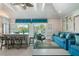 Open living space with comfortable blue sofas and coastal decor at 2903 Hill St, New Smyrna Beach, FL 32169