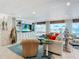 Relaxing living area with ocean view, comfy seating, and coastal decor at 2903 Hill St, New Smyrna Beach, FL 32169