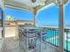Balcony with ocean view and comfortable seating at 2903 Hill St, New Smyrna Beach, FL 32169