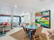 Casual dining area with ocean view and a round wooden table at 2903 Hill St, New Smyrna Beach, FL 32169
