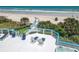 Elevated view of deck, hot tub, and ocean access at 2903 Hill St, New Smyrna Beach, FL 32169