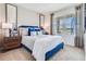 Bright bedroom featuring a queen-size bed and window at 7163 Painted Bunting Way, St Cloud, FL 34773