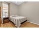 Bedroom with a queen bed and night stand at 10946 Piping Rock Cir, Orlando, FL 32817