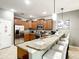 Modern kitchen with stainless steel appliances and granite countertops at 1410 Wexford Way, Davenport, FL 33896