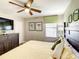 Bedroom with king-size bed and neutral decor at 1410 Wexford Way, Davenport, FL 33896