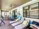 Relaxing patio with lounge chairs and Mickey Mouse themed wall at 1410 Wexford Way, Davenport, FL 33896