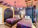 Themed bedroom with Hogwarts Express mural and two twin beds at 1410 Wexford Way, Davenport, FL 33896