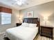Spacious main bedroom with king-size bed and neutral decor at 1410 Wexford Way, Davenport, FL 33896