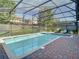 Refreshing pool and spa in a private screened enclosure at 1410 Wexford Way, Davenport, FL 33896