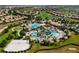 Community features large pools, a clubhouse, and nearby homes at 1410 Wexford Way, Davenport, FL 33896