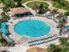 Lap pool with plenty of lounge chairs for sunbathing at 1410 Wexford Way, Davenport, FL 33896