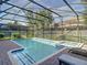 Screened pool and spa with plenty of patio space at 1410 Wexford Way, Davenport, FL 33896