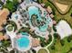 Resort-style community pool with expansive sundeck and beach volleyball at 1410 Wexford Way, Davenport, FL 33896