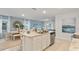 Modern kitchen with island, stainless steel appliances, and ample counter space at 1527 Ellesmere Ave, Haines City, FL 33844