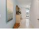 Light and airy entryway with storage at 1527 Ellesmere Ave, Haines City, FL 33844