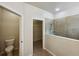 Bathroom with toilet and walk-in closet at 3420 Sagebrush St, Harmony, FL 34773