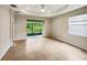 Spacious bedroom with sliding glass doors to patio at 3420 Sagebrush St, Harmony, FL 34773