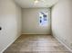 Bright bedroom with a window and tile floors at 3420 Sagebrush St, Harmony, FL 34773