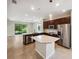 Modern kitchen with stainless steel appliances and an island at 3420 Sagebrush St, Harmony, FL 34773
