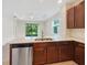 Modern kitchen with stainless steel appliances and ample counter space at 3420 Sagebrush St, Harmony, FL 34773