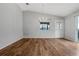 Dining room with wood floors, neutral walls and a chandelier at 17479 Se 82Nd Pecan Ter, The Villages, FL 32162