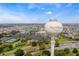 Aerial view of The Villages, Florida, featuring a water tower and community amenities at 17479 Se 82Nd Pecan Ter, The Villages, FL 32162