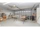 Large garage workshop with ample storage and workbenches at 1395 San Luis Ct, Winter Springs, FL 32708