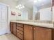 Double vanity bathroom with granite countertop at 515 Pamplona Pl, Davenport, FL 33837