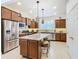 Modern kitchen with stainless steel appliances and granite countertops at 515 Pamplona Pl, Davenport, FL 33837
