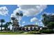 Attractive community entrance with fountain and signage at 515 Pamplona Pl, Davenport, FL 33837