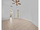 Bright bedroom with tile floors and two doors at 143 Brunswick Dr, Davenport, FL 33837