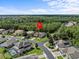 Property location shown in neighborhood setting with lush landscaping at 143 Brunswick Dr, Davenport, FL 33837