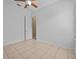 Spacious bedroom with tile floors and a door at 143 Brunswick Dr, Davenport, FL 33837