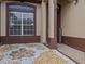 Welcoming front entry with stone and landscaping at 143 Brunswick Dr, Davenport, FL 33837