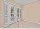 Gathering room showcasing sliding doors and pool view at 143 Brunswick Dr, Davenport, FL 33837