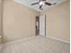 Bright bedroom with tile floors and a ceiling fan at 143 Brunswick Dr, Davenport, FL 33837