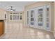 Gathering room with sliding doors leading to the pool area at 143 Brunswick Dr, Davenport, FL 33837