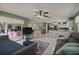 Open living area with comfortable seating and access to patio at 2101 Appy Ln, Apopka, FL 32712