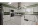 Bright kitchen featuring an island and stainless steel appliances at 2101 Appy Ln, Apopka, FL 32712