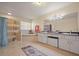 Primary bathroom with double vanity, soaking tub, and separate shower at 2101 Appy Ln, Apopka, FL 32712