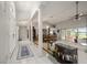 Bright entryway with tile flooring, high ceilings, and views into the formal dining room and living areas at 2101 Appy Ln, Apopka, FL 32712