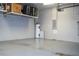 Garage with overhead storage and ample space for two cars at 13272 Roxboro Rd, Windermere, FL 34786