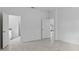 Open concept bedroom with access to kitchen and backyard at 2866 Lingo Ln, Orlando, FL 32822
