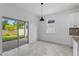 Bright kitchen features sliding door to backyard access at 2866 Lingo Ln, Orlando, FL 32822