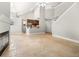 Open living room features a fireplace and tile flooring, with kitchen access at 1473 Farrindon Cir, Lake Mary, FL 32746