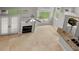 High-ceiling living room with fireplace and tile flooring at 1473 Farrindon Cir, Lake Mary, FL 32746