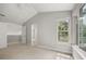 Bedroom with large window and carpet flooring at 1473 Farrindon Cir, Lake Mary, FL 32746