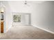 Main bedroom with carpeted floor and ceiling fan at 1473 Farrindon Cir, Lake Mary, FL 32746