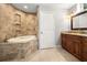 Elegant bathroom with soaking tub and double vanity at 1473 Farrindon Cir, Lake Mary, FL 32746